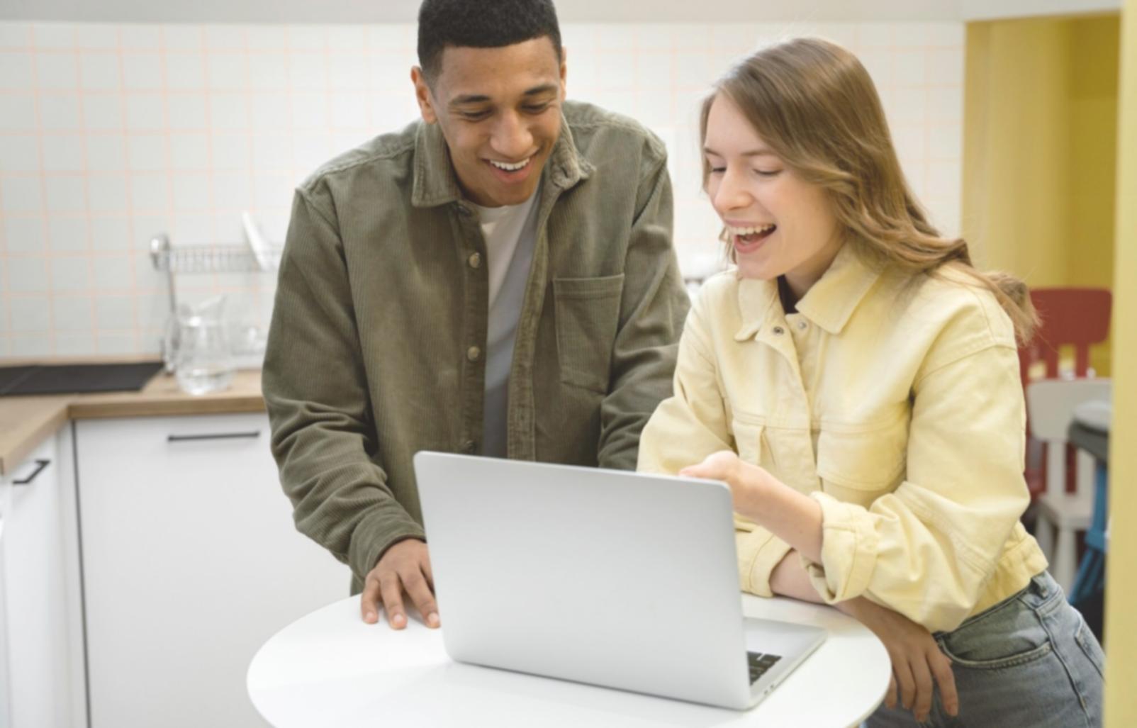 Professional financial analysis workspace with multiple monitors displaying market data and investment charts